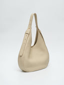 Reco Halston white Togo calfskin leather hobo bag with a minimalist silhouette and adjustable shoulder strap