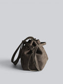 Reco L'erreur Falcon Gray Nubuck leather dumpling bag with drawstring top and geometric base.