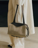 Reco Morph Boston (S) bag in moss grey cotton-linen canvas with dark brown leather trim and straps.