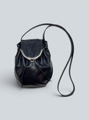 Reco Shell Bag crossbody in cyan blue oil-waxed cowhide with kiss-lock clasp and drawstring closure.