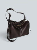 Reco Wander (M) rosewood leather handbag with flying-tail zipper and compass charm.
